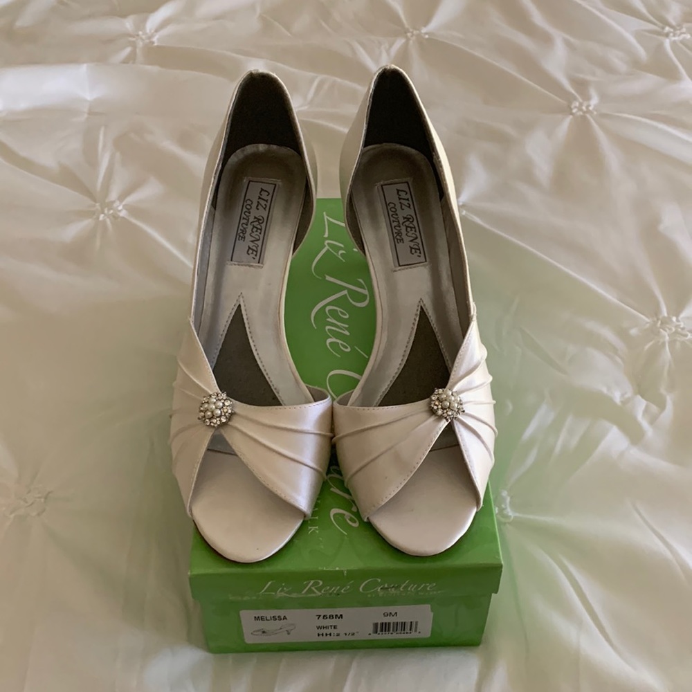 Brand new. Never worn. Beautiful bridal shoes.
